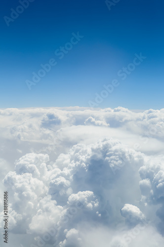 blue sky with clouds vertical © PaulPaladin