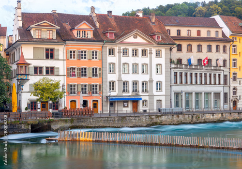 Lucerne. Old city embankment and medieval houses at dawn.