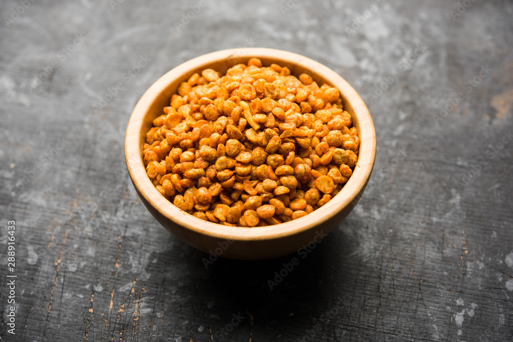 Fried and Spicy Chana Dal Masala is a popular Chakna recipe. served in a bowl. selective focus Fried and Spicy Chana Dal Masala is a popular Chakna recipe. served in a bowl. selective focus