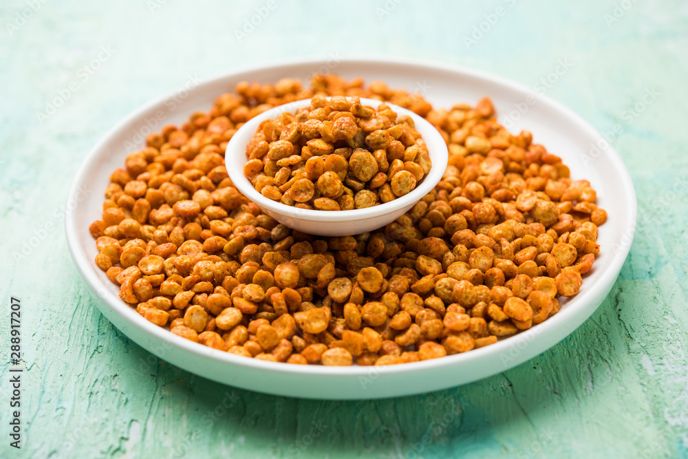 Fried and Spicy Chana Dal Masala is a popular Chakna recipe. served in a bowl. selective focus Fried and Spicy Chana Dal Masala is a popular Chakna recipe. served in a bowl. selective focus