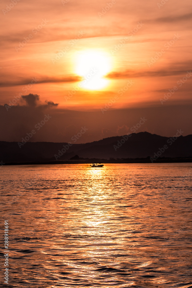 Sunset on the Irrawaddy River (Ayeyarwaddy River) in Bagan, Myanmar (Burma) Sunset on the Irrawaddy River (Ayeyarwaddy River) in Bagan, Myanmar (Burma)