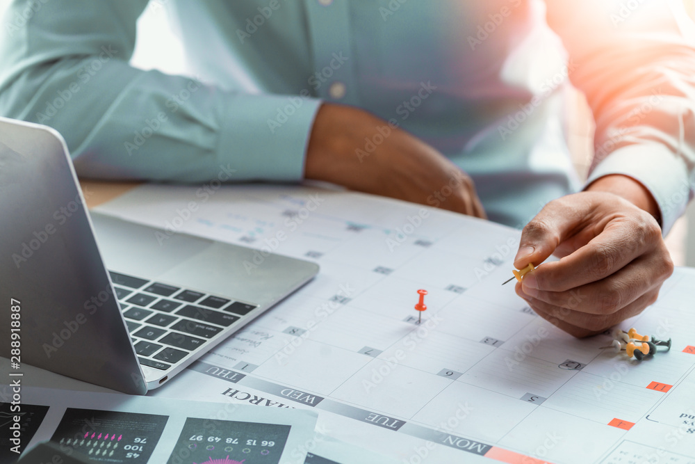 Business Man with laptop, Calendar in office, Business management event . Organizational management, business plan targeted marketing activities, media relations advertising. - obrazy, fototapety, plakaty 