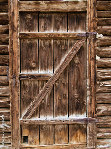 Old rustic door on timber building in Wyoming