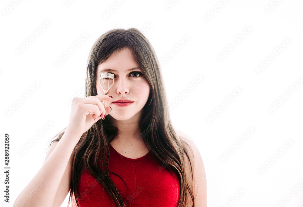 17 year old teenage girl fixing her eyelashes 17 year old teenage girl fixing her eyelashes