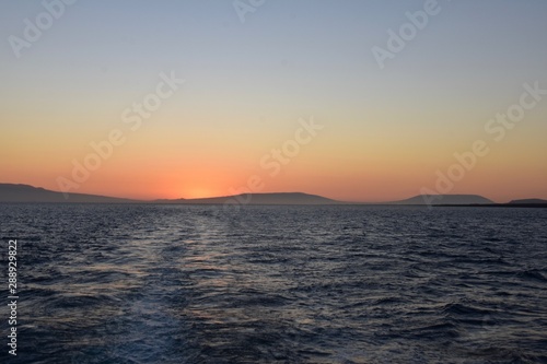 Galapagos Cruises -Sunset over the sea