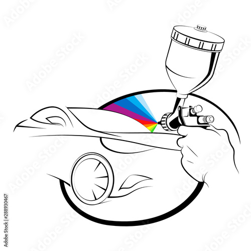 Painting a car with a spray gun in hand