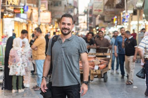 Baghdad, Iraq – July 6, 2019: Handsome arabic man on Baghdad street © focusandblur