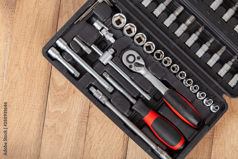 Tool set for machine repair, on wooden background. Car toolbox Tool set for machine repair, on wooden background. Car toolbox