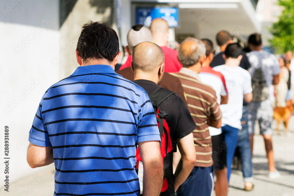 people queue in line up draggle , selective focus people queue in line up draggle , selective focus