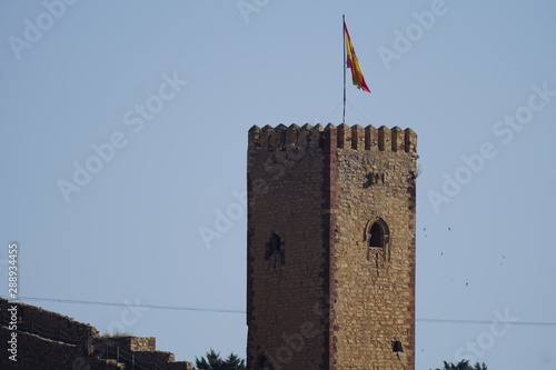 almena con bandera de esapaña castillo de molina de aragon guadalajara castilla la mancha españa photo