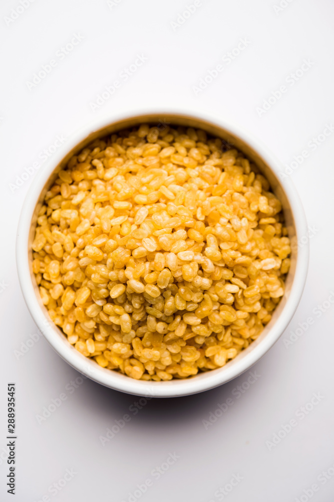 Salty and Fried Moong Dal Namkeen served in a bowl, selective focus Salty and Fried Moong Dal Namkeen served in a bowl, selective focus