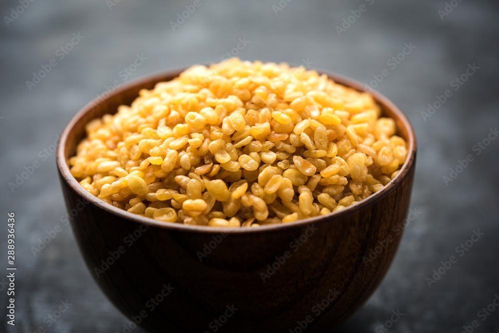 Salty and Fried Moong Dal Namkeen served in a bowl, selective focus Salty and Fried Moong Dal Namkeen served in a bowl, selective focus