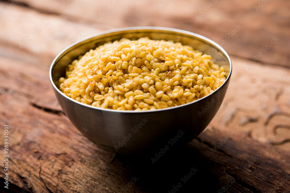 Salty and Fried Moong Dal Namkeen served in a bowl, selective focus Salty and Fried Moong Dal Namkeen served in a bowl, selective focus