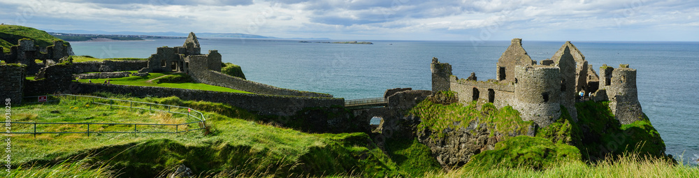 Panoramic view of Dunluce Castle above the cliffs, Antrim, Causeway Coastal Route, Northern Ireland