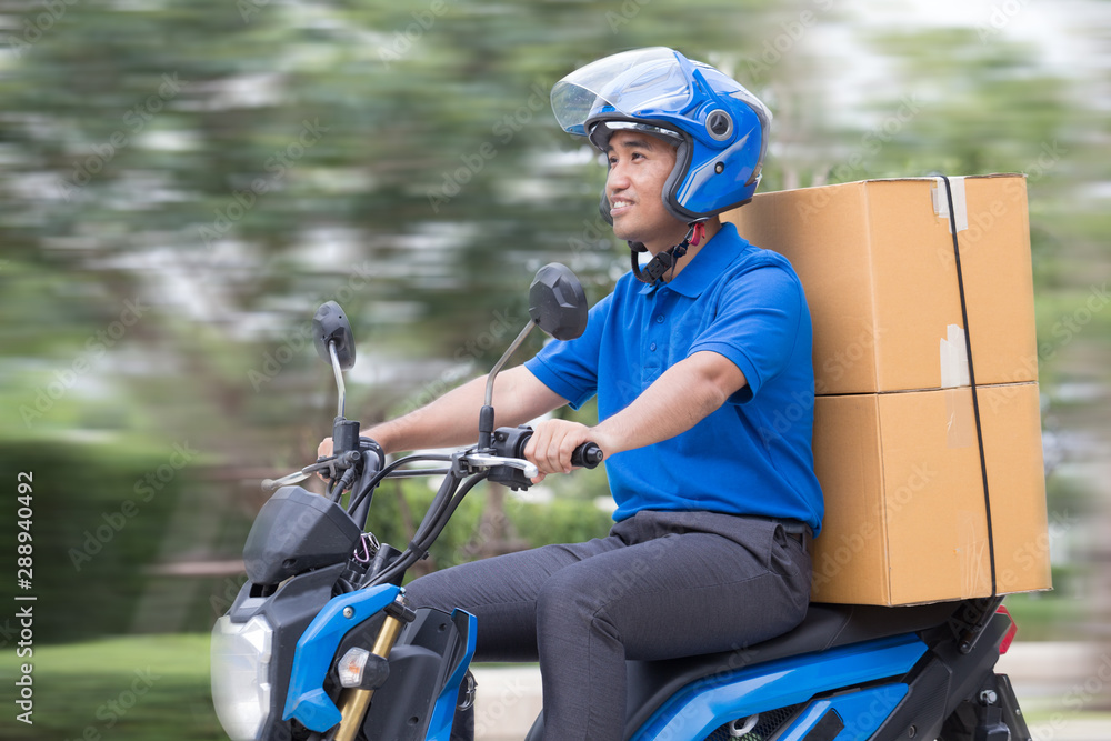 Courier delivering parcel box by motorcycle or scooter. Fast express transport delivery concept