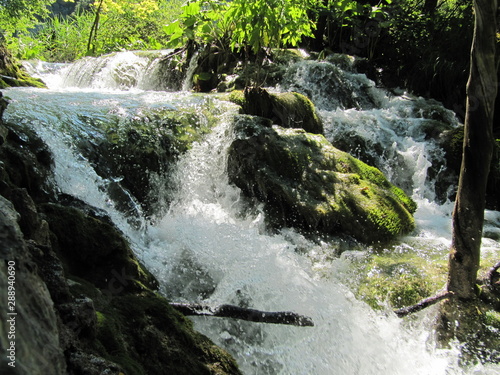 waterfall with small cascades of water in the Plitvice lakes national Park in Croatia.