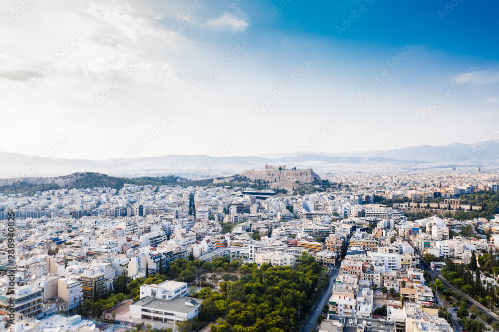 Aerial view of the historical city centre of Athens with the Acropolis in the shot.
