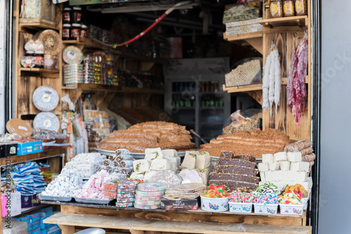 Selling cakes on the street market photo