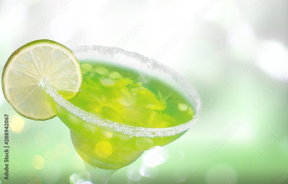 Glass of alcohol cocktail on background Glass of alcohol cocktail on background
