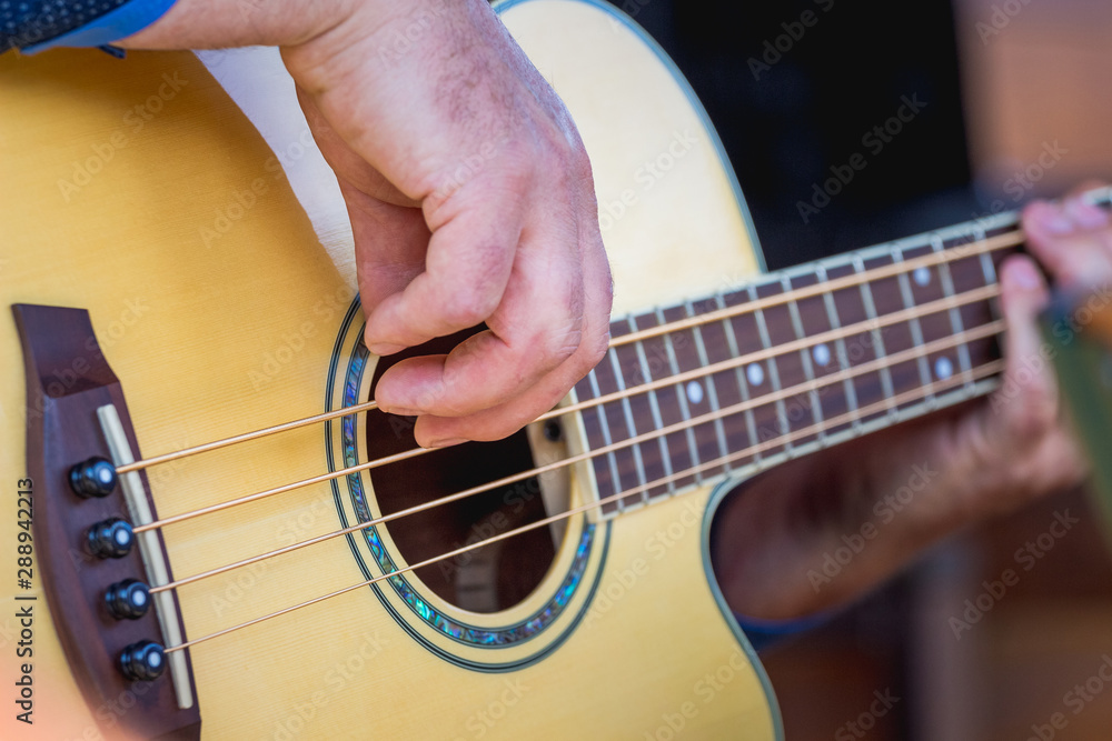 The musician plays the guitar. Concert popular music_