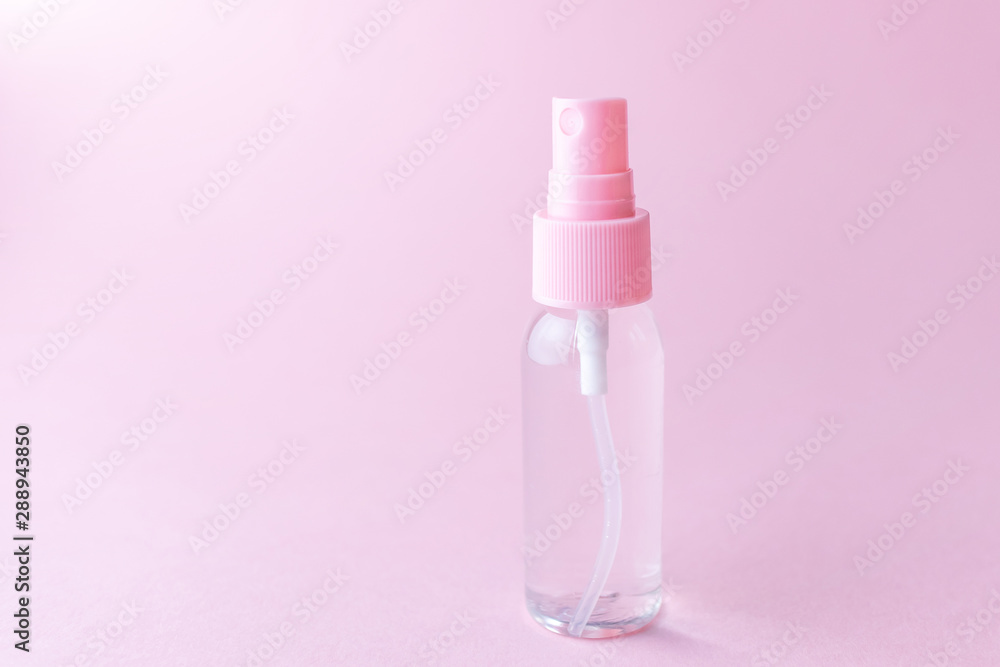 Cosmetic bottle with transparent lotion on a pastel pink background. The concept of cosmetics, skin care, beauty and health. Minimalism, place for text. Cosmetic bottle with transparent lotion on a pastel pink background. The concept of cosmetics, skin care, beauty and health. Minimalism, place for text.