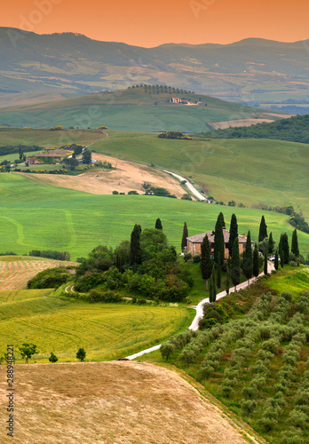 Famous Podere Belvedere Villa Belvedere in summer season  in the heart of the Tuscany at sunset. Val d Orcia.