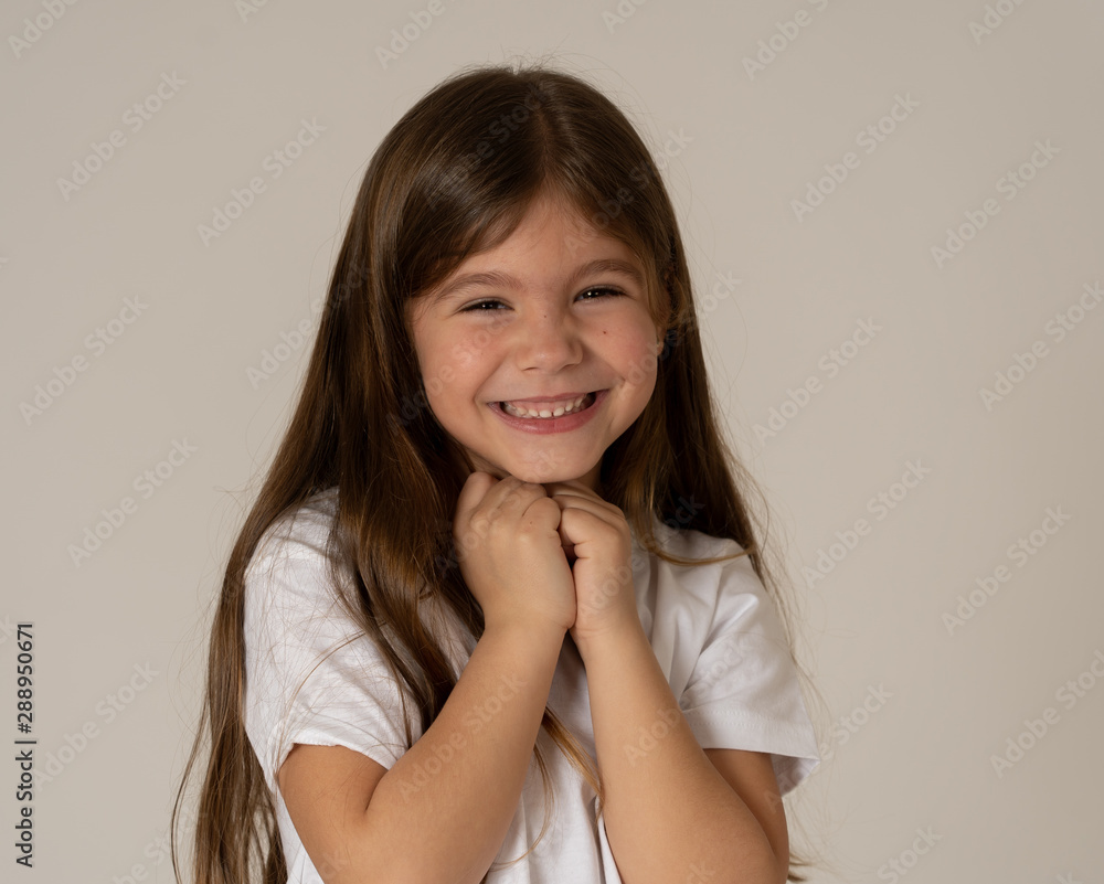 Portrait of a beautiful happy, successful girl celebrating victory. Human emotions facial expression Portrait of a beautiful happy, successful girl celebrating victory. Human emotions facial expression