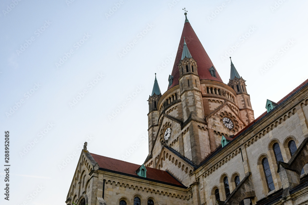Fototapeta premium The St. Francis of Assisi Church in Vienna, Austria at sunrise. Also known as the Kaiser Jubilee Church and the Mexico Church
