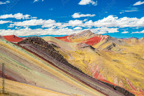 Stunning view at Palccoyo rainbow mountain (Vinicunca alternative), mineral colorful stripes in Andean valley, Cusco, Peru, South America