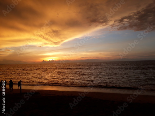 sunset on beach © Victor