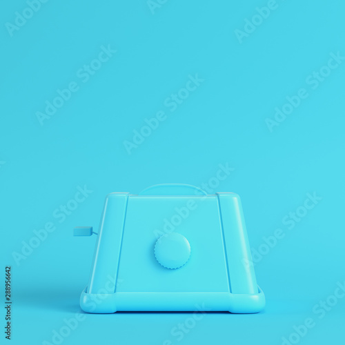 Toaster on bright blue background in pastel colors. Minimalism concept