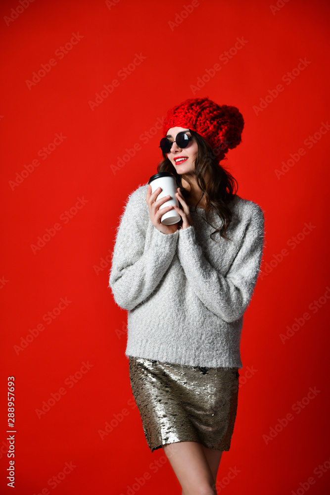 Plakat winter, people, happiness, drink and fast food concept - woman in hat with takeaway tea or coffee cup