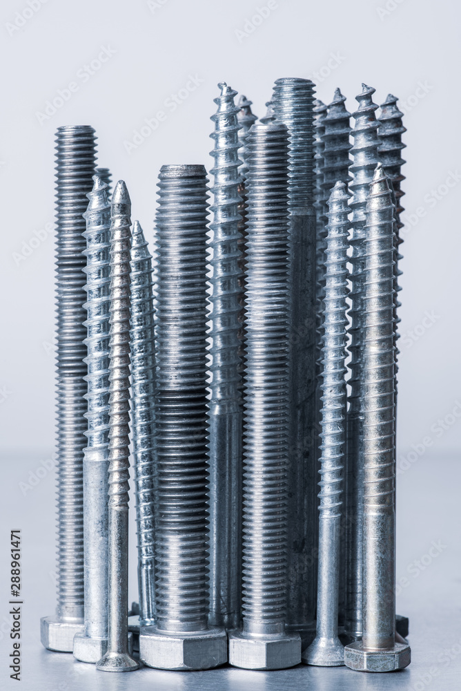 Bolts and screws on the table workshop Bolts and screws on the table workshop
