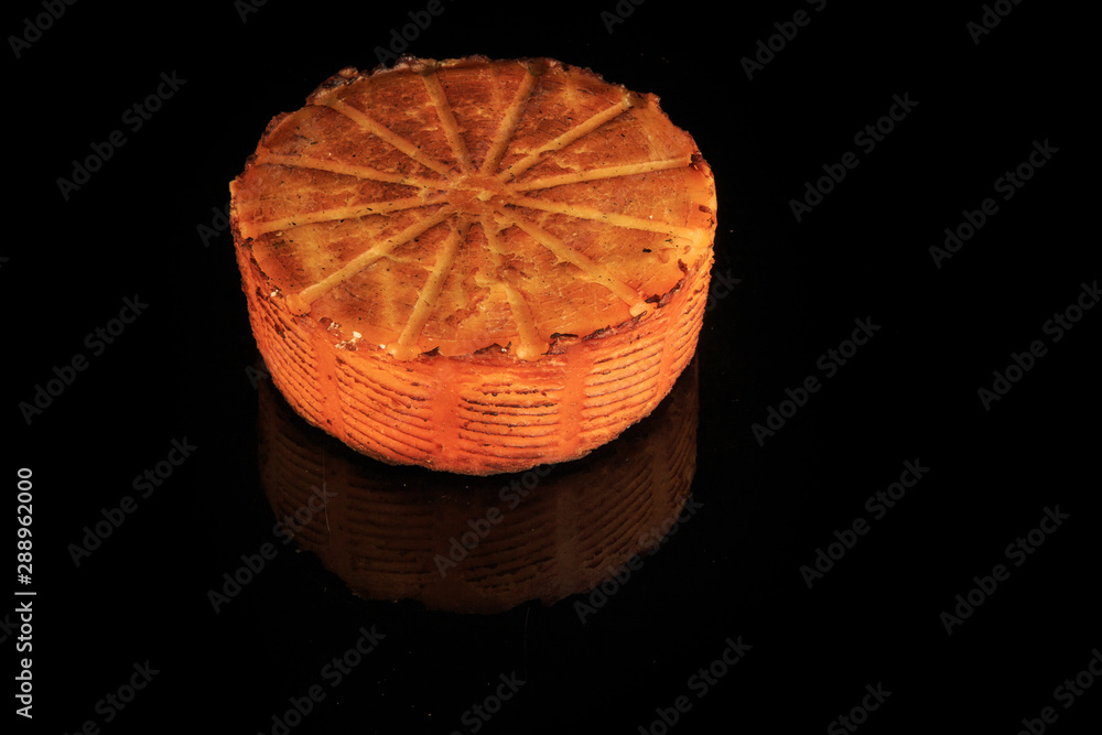 top view on whole round head of baked homemade cheese top view on whole round head of baked homemade cheese