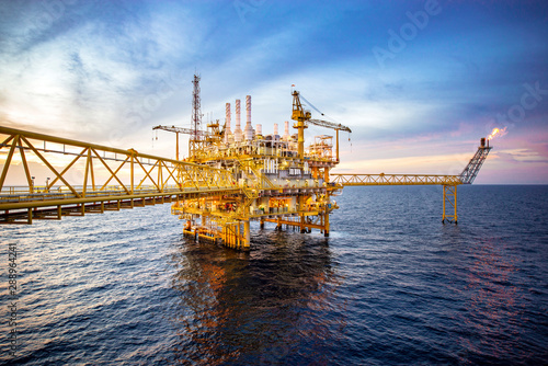 Offshore oil and gas rig platform with beautiful sky in the gulf of Thailand.