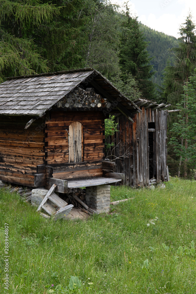 A small wooden shed in the Alps