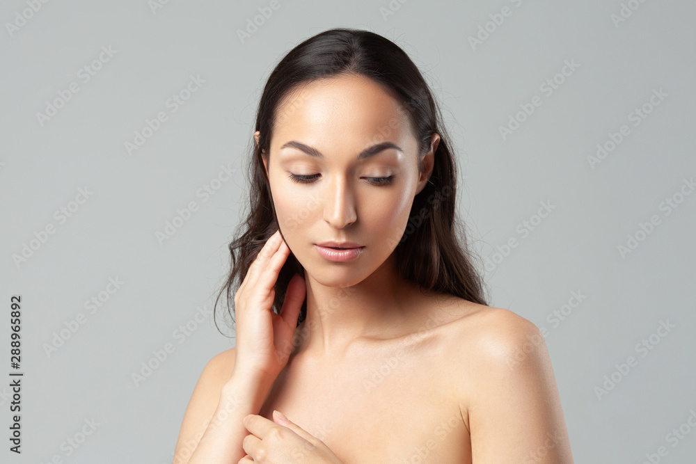 Young beautiful woman with clean perfect skin close-up. Young beautiful woman with clean perfect skin close-up.