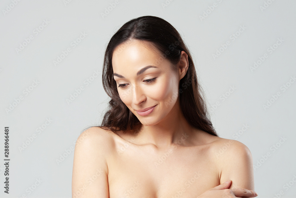 Young beautiful woman with clean perfect skin close-up. Young beautiful woman with clean perfect skin close-up.