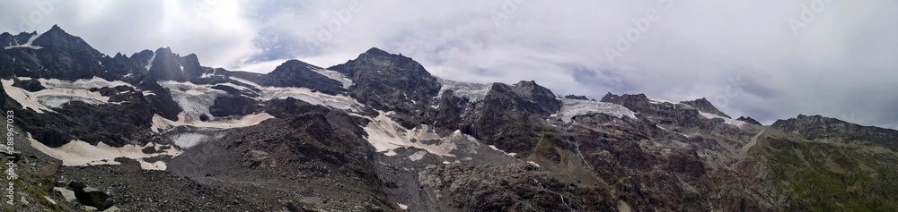 Panormic view in the  high mountains - glaciers and peaks - Grand Paradiso mountains , Valnontey, Aosta Valley, Italy