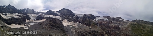 Panormic view in the high mountains - glaciers and peaks - Grand Paradiso mountains , Valnontey, Aosta Valley, Italy