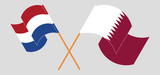 Crossed and waving flags of Netherlands and Qatar