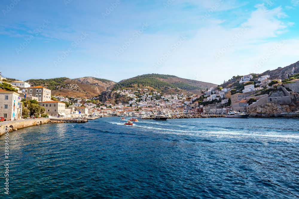 Picturesque View at the Port with water taxi Town of Hydra Island in Greece