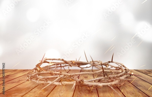 Twisted crown of thorns on a wooden table