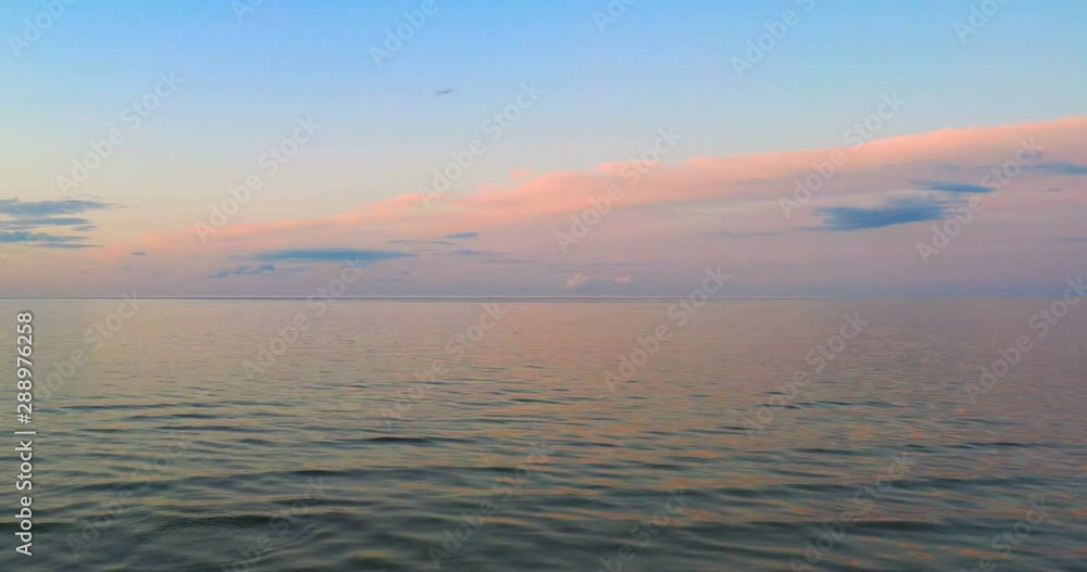 Aerial view wonderful dark silver sea with sunset twilight sky in the evening time. Scenery moment. spirit of serene and zen. image for background, wallpaper, interior Aerial view wonderful dark silver sea with sunset twilight sky in the evening time. Scenery moment. spirit of serene and zen. image for background, wallpaper, interior