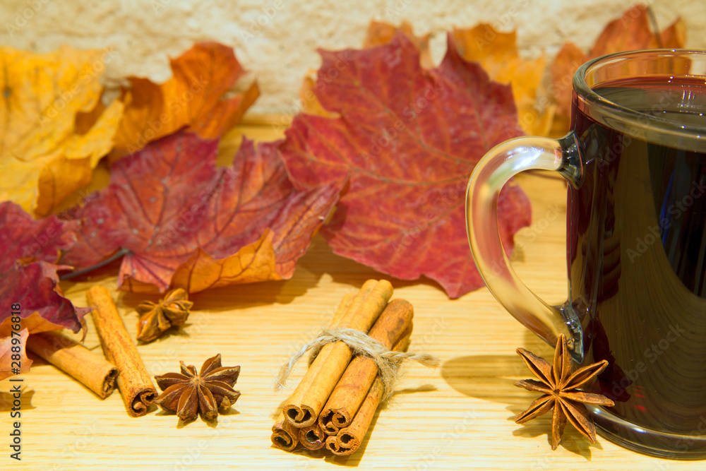Red mulled wine with cinnamon and anise spices, bright dried orange decoration. Red mulled wine with cinnamon and anise spices, bright dried orange decoration.