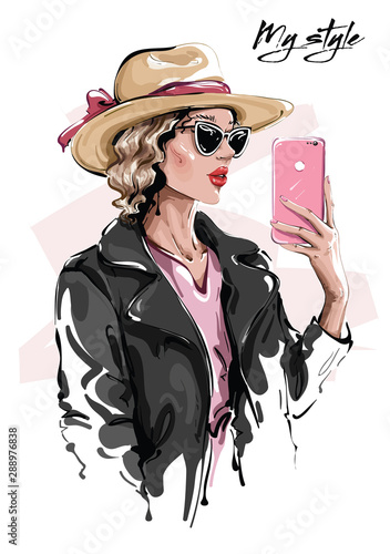 Hand drawn beautiful young woman in sunglasses. Stylish girl in hat. Fashion woman making selfie. Sketch. Vector illustration.