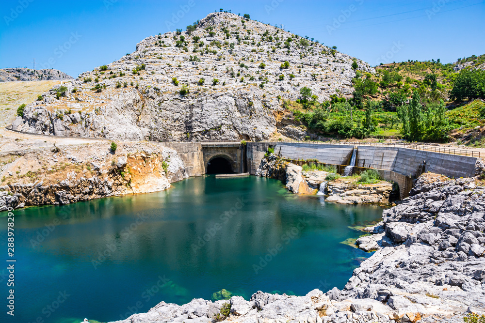 Fototapeta premium Water dam near Mjeda with clear water in river Drini, Albania