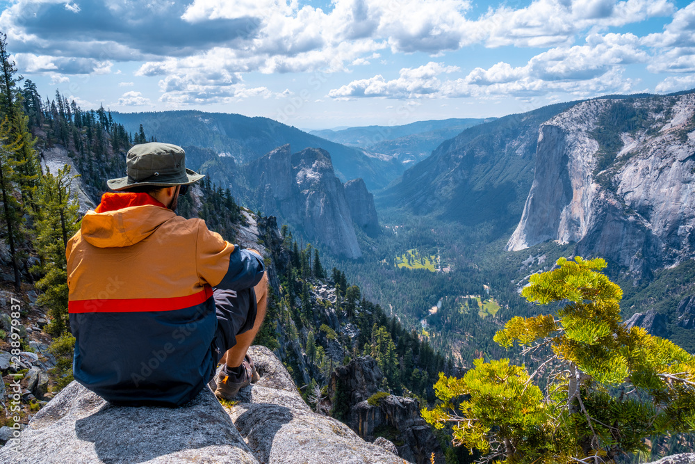 Sitting on a lookout overlooking Yosemite National Park and El Capitan. United States