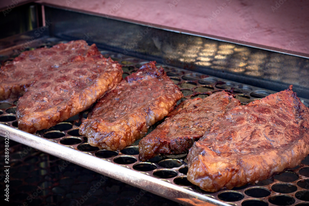 close up of picanha barbecue on the grill close up of picanha barbecue on the grill