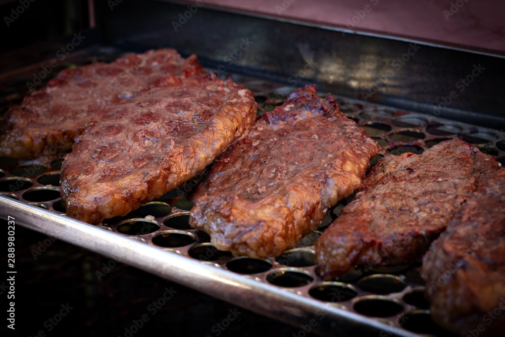 close up of picanha barbecue on the grill close up of picanha barbecue on the grill